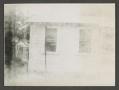 Photograph: [A light-colored house]