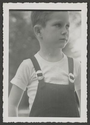 [Photograph of Tim Williams in overalls, 2]