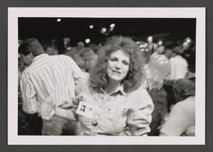 [Photograph of a woman at an event]
