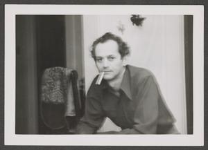 [Photograph of Byrd Williams III with a cigarette in his mouth]