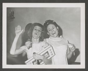 [Photograph of two women posing together]