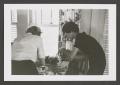 Primary view of [Doris and another woman preparing food]