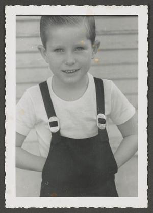 [Photograph of Tim Williams in overalls, 6]
