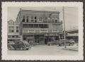 Photograph: [Photograph of a storefronts on a city street]