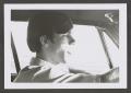 Photograph: [Photograph of a young man driving]