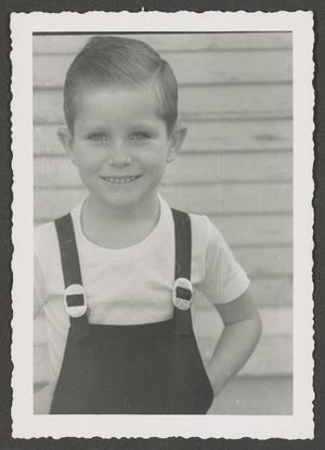 [Photograph of Tim Williams in overalls, 4]