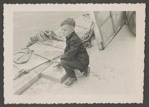 [Photograph of Tim Williams on a dock]