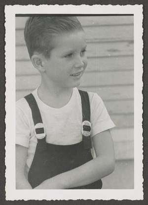 [Photograph of Tim Williams in overalls, 5]