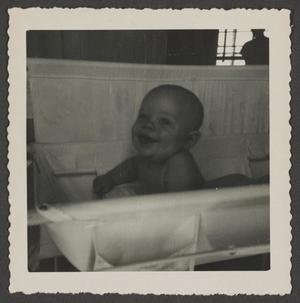 [Photograph of Paul Stiles in a bassinet]