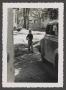 Photograph: [Tim standing in a driveway]