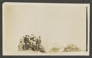 [Group of people on a hill]