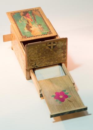 Primary view of [Open compartments in puzzle box]