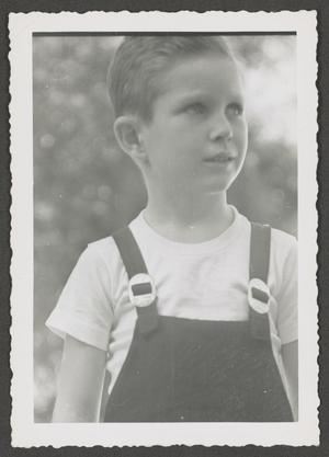 [Photograph of Tim Williams in overalls]