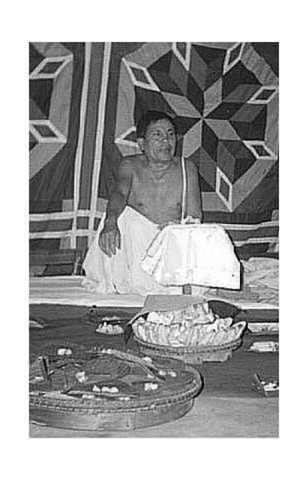 Primary view of object titled 'Photograph of Kalachand Singh with a tapestry'.