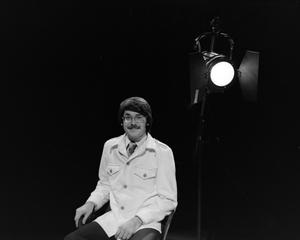 [Photograph of David Finfrock posing for a portrait by a spotlight, 2]