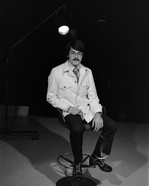 [Photograph of David Finfrock posing for a portrait in a chair, 3]