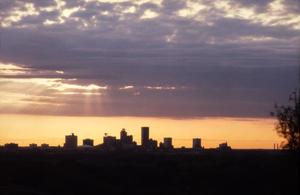 [Houston skyline at dusk]