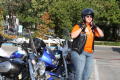 Photograph: [Team Ops member in front of motorcycles at the second LSRFA pit-stop]