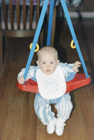 [Baby in bouncy contraption]