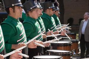 [Mean Green Brigade playing drums in UNT Homecoming Parade, 2007]