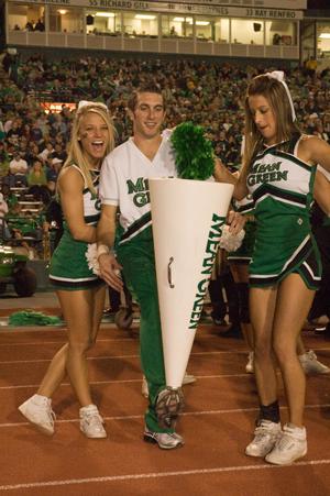 [Cheerleader balancing cone on his toe at homecoming, 2007]