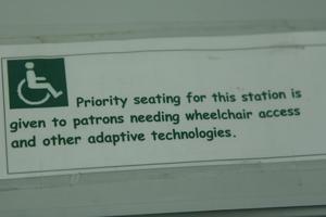 Primary view of object titled '[Label on wheelchair access computer desk]'.