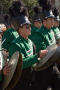 Photograph: [Mean Green Brigade playing cymbals in UNT Homecoming Parade, 2007]