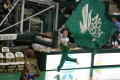 Photograph: [Flag runner at Men's Basketball game, January 31, 2008]