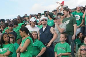 [Navy members in stands at the UNT v Navy game]