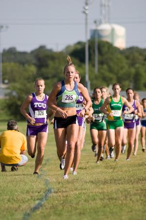 [Women's Cross Country runners on course]
