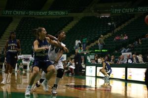 [NT Women's Basketball player against FIU player]