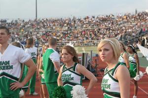 [NT Cheer gathered on track at the UNT v Navy game]