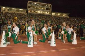 [NT Cheer team at rest during Homecoming game, 2007]