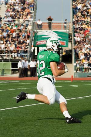 [Micah Mosley running the ball during UNT vs. Navy game, 2007]