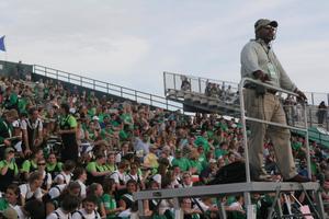 [Mean Green Brigade in stands at the UNT v Navy game]