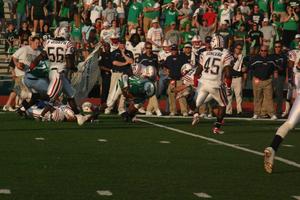 [FAU player tackling UNT player, September 22, 2007]
