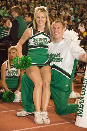 [NT Cheer pairs resting during Homecoming game, 2007]