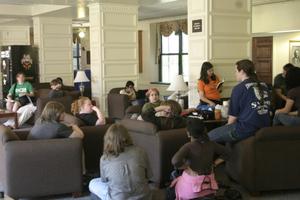 [Students sitting in the Bruce Hall common area]