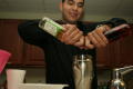 Primary view of [Michael Rodriguez bartending at UNT Casino Night]