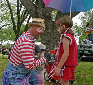 [Clown and young girl at Denton Arts & Jazz Festival]