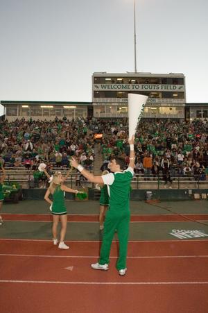 [Cheer members leading crowd at Homecoming game, 2007]