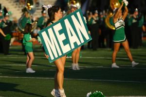 [Cheerleader holding MEAN sign, October 13, 2007]