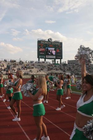[Dancers performing on the track at the UNT v Navy game]