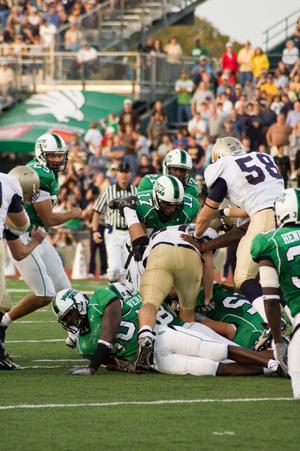 [Players in dog-pile during UNT vs. Navy game, 2007]