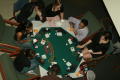 Thumbnail image of item number 1 in: '[Students around game table set-up at UNT Casino Night]'.