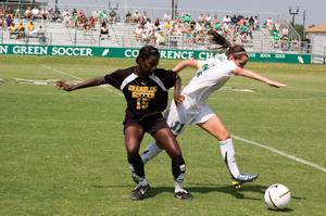 [Kendall Juett fighting for control of the soccer ball]