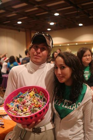 [Students with candy bowl at Boo Bash]