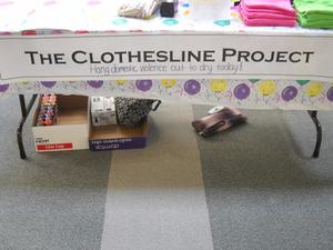 Primary view of object titled '[Clothesline Project table]'.