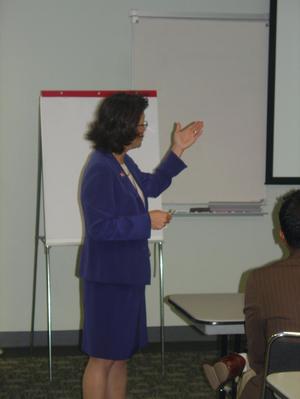 [Woman leading breakout session at 2007 WOC Conference]