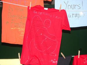 [Shirts hanging at Clothesline Project]